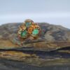Anillo Trío Moraya – Cobre con oro laminado y esmeraldas naturales en bruto
